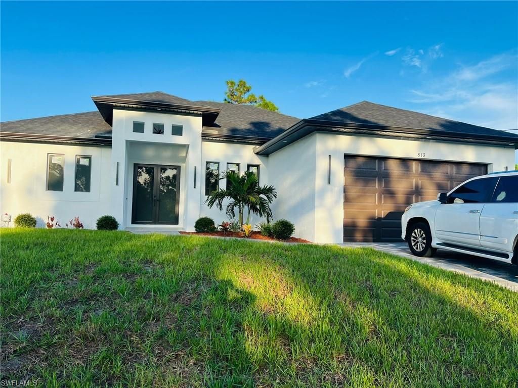 813 Aiken AVE, Lehigh Acres, FL 33974