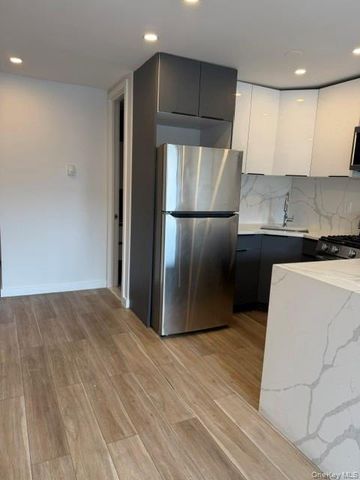5219 103rd Street, Corona, NY 11368