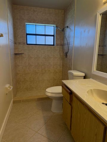 4413 Woodstock Drive A, West Palm Beach, FL 33409