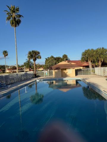 4413 Woodstock Drive A, West Palm Beach, FL 33409