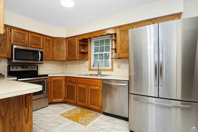 1112 Village Drive, Manhattan, KS 66503