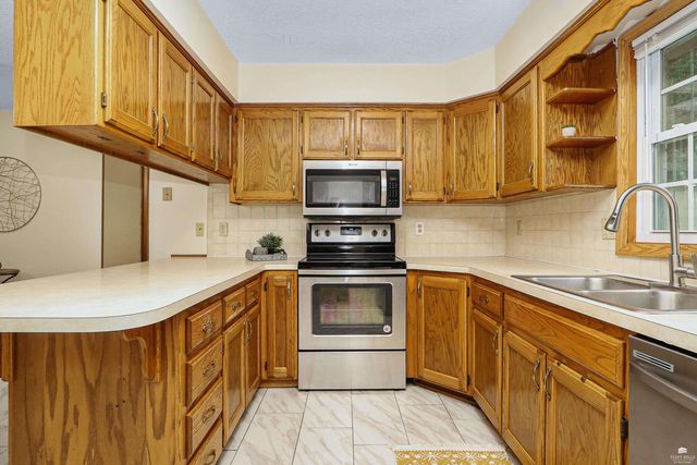 1112 Village Drive, Manhattan, KS 66503