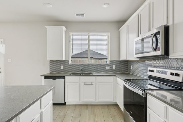 969 Ravenwood Lane, Van Alstyne, TX 75495