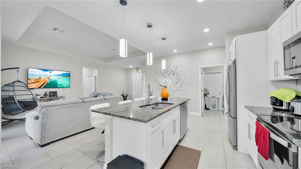 Image 11 of property listing at 221 Chiquita BLVD N, Cape Coral, FL 33993