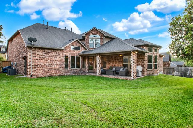 210 Chirping Squirrel Court, Pinehurst, TX 77362