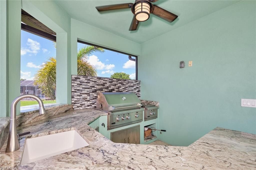 Image 9 of property listing at 3309 SW 2nd LN, Cape Coral, FL 33991