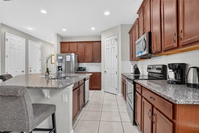 9007 PELICAN COVE TRACE, Kissimmee, FL 34747