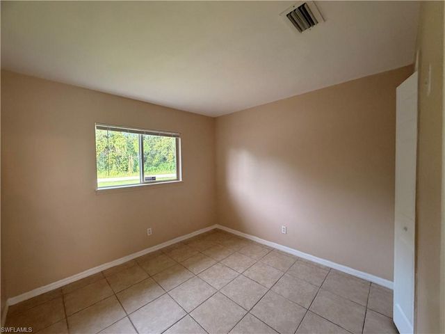 143 Meadow RD, Lehigh Acres, FL 33973