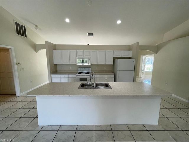1221 Summa BLVD, Lehigh Acres, FL 33974