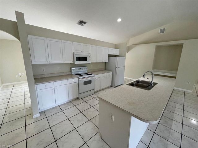 1221 Summa BLVD, Lehigh Acres, FL 33974