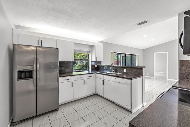 1273 Spring Cir Drive, Coral Springs, FL 33071