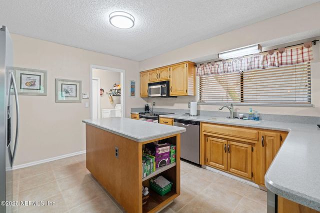 7210 SECRET WOODS Drive, Jacksonville, FL 32216