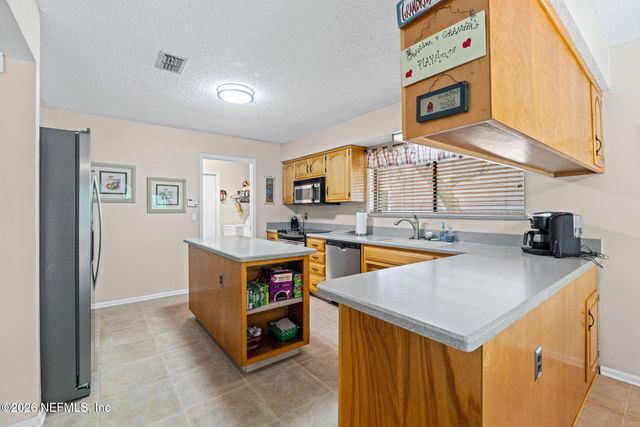 7210 SECRET WOODS Drive, Jacksonville, FL 32216