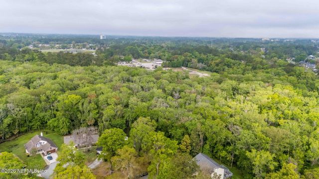 7210 SECRET WOODS Drive, Jacksonville, FL 32216