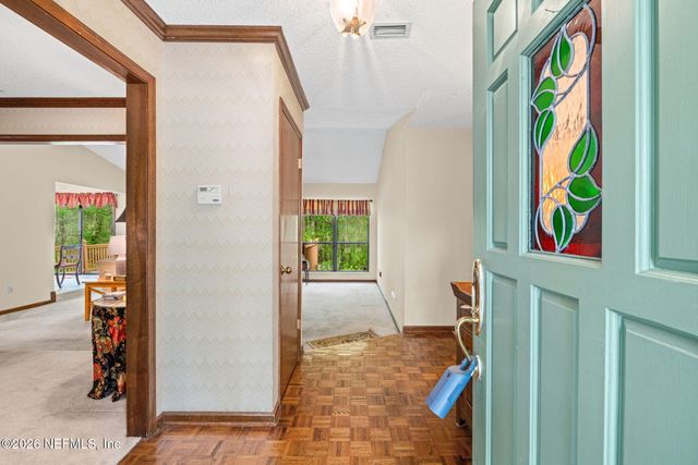 7210 SECRET WOODS Drive, Jacksonville, FL 32216