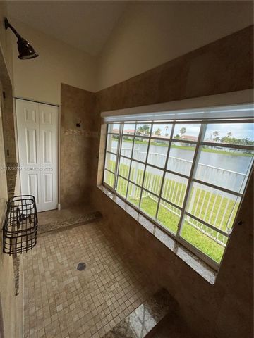 1127 Laguna Springs Dr, Weston, FL 33326