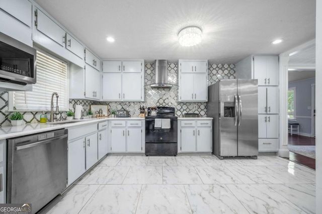 493 Greg Drive SW, Lilburn, GA 30047