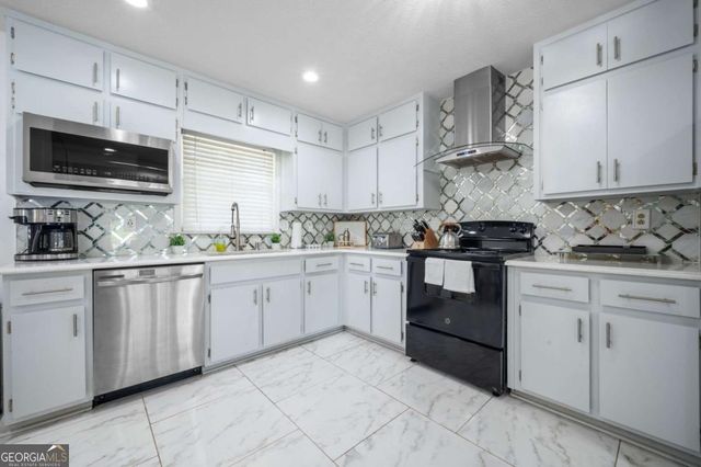493 Greg Drive SW, Lilburn, GA 30047