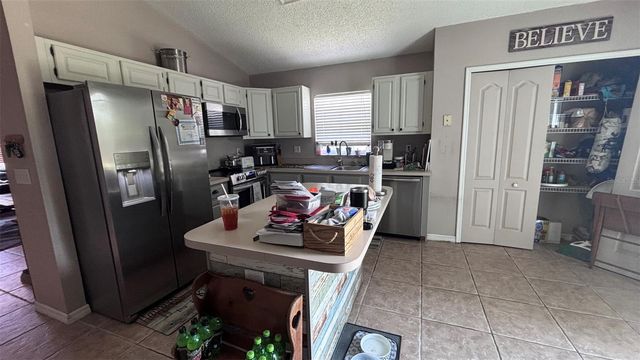 1045 KELSEY AVENUE, Oviedo, FL 32765