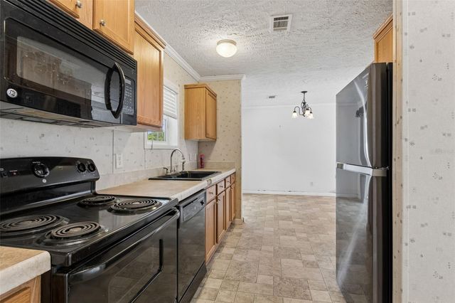 6735 RAVENWOOD STREET, Wesley Chapel, FL 33544