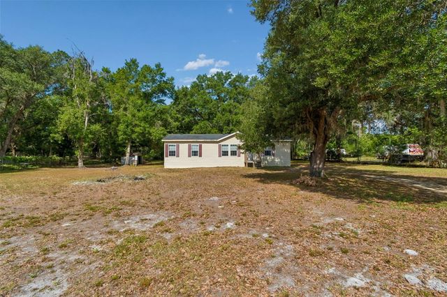 6735 RAVENWOOD STREET, Wesley Chapel, FL 33544
