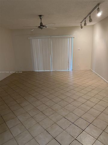 6061 N Falls Cir Drive 106, Lauderhill, FL 33319