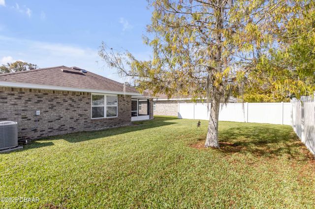 607 Coral Trace Boulevard, Edgewater, FL 32132