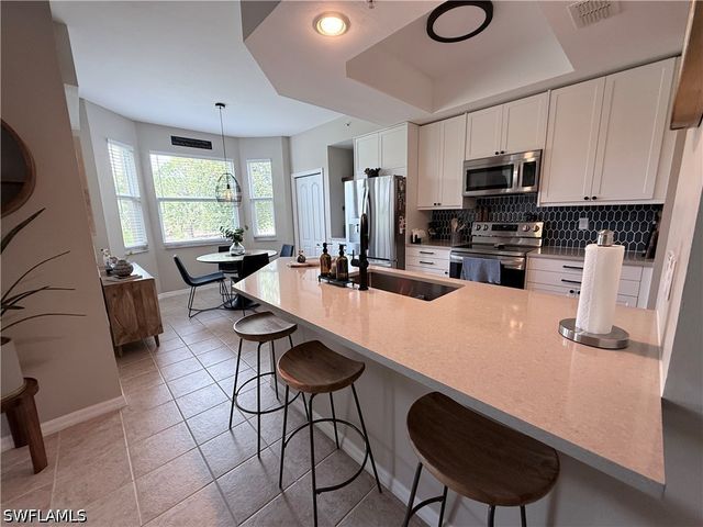 2835 Cypress Trace CIR 102, Naples, FL 34119