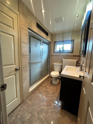 16 Spring Street, Roosevelt, NY 11575