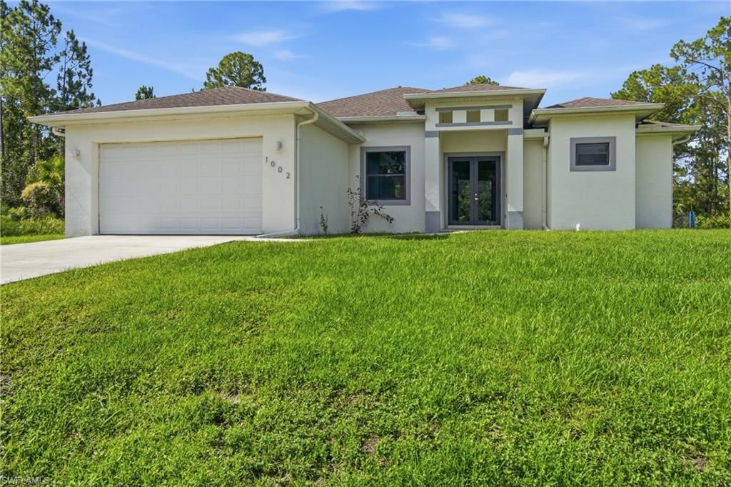 1002 E 5th ST, LEHIGH ACRES, FL 33972 — exterior