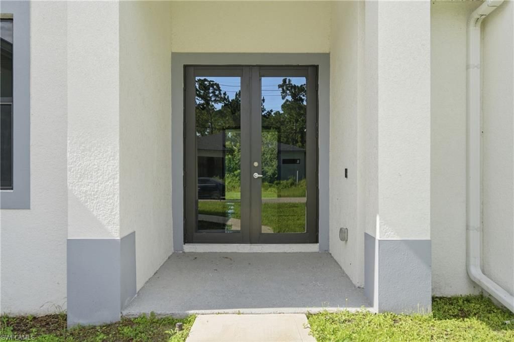 1002 E 5th ST, LEHIGH ACRES, FL 33972 — photo 5