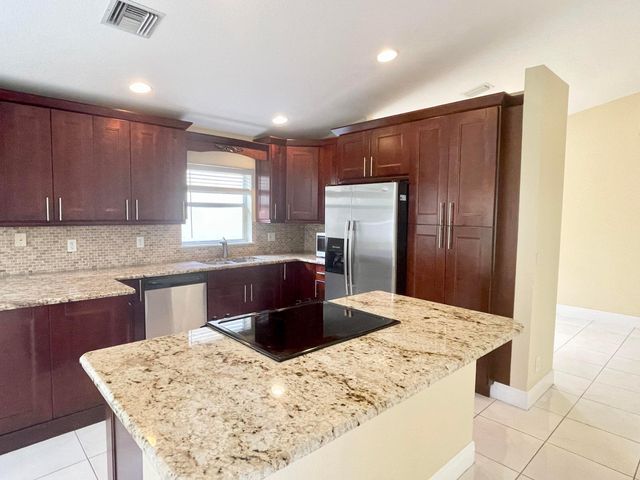 2425 Pigeon Cay, West Palm Beach, FL 33411