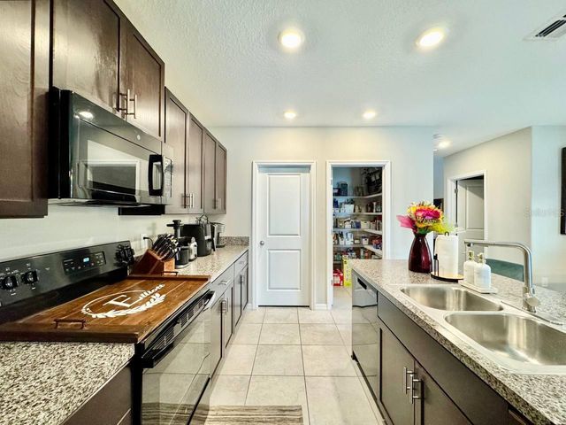 7309 CANTERBURY BELLS COURT, Tampa, FL 33619