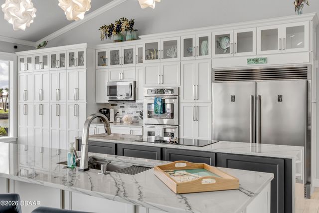 444 Quay Assisi Court, New Smyrna Beach, FL 32169