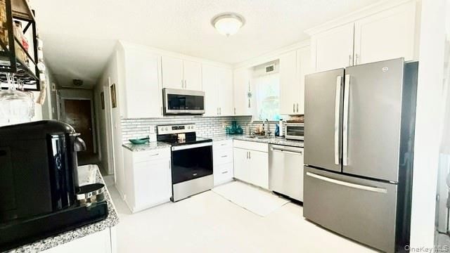 26 Robinwood Street, Mastic, NY 11950