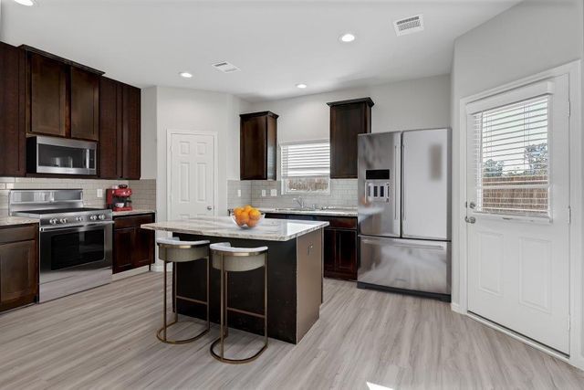 9992 Enclave Grove, Willis, TX 77318