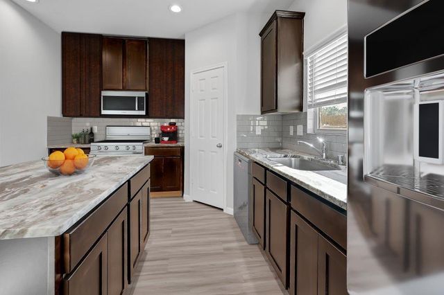 9992 Enclave Grove, Willis, TX 77318