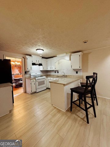 815 Sunfield Drive NW, Lilburn, GA 30047