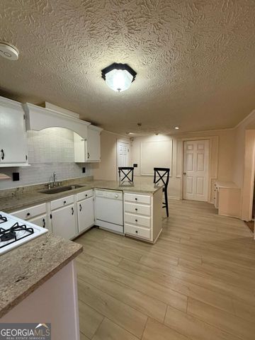 815 Sunfield Drive NW, Lilburn, GA 30047