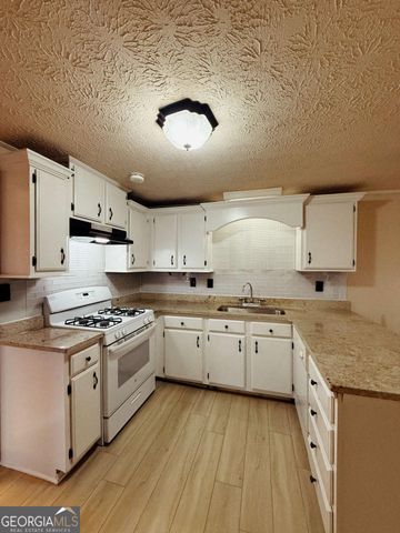 815 Sunfield Drive NW, Lilburn, GA 30047