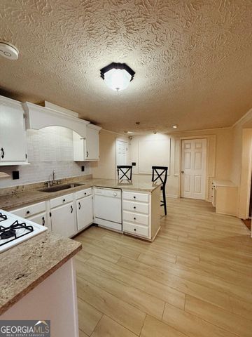 815 Sunfield Drive NW, Lilburn, GA 30047