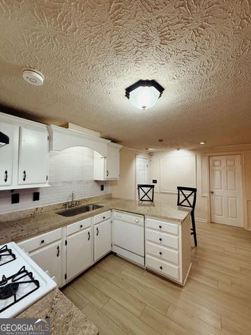 815 Sunfield Drive NW, Lilburn, GA 30047