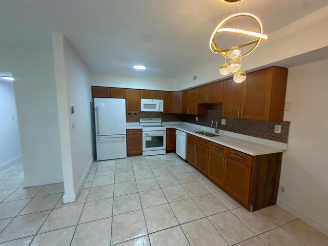 6583 Boulevard Of Champions, North Lauderdale, FL 33068