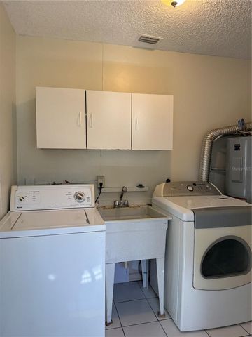 1111 E OKALOOSA AVENUE, Tampa, FL 33604