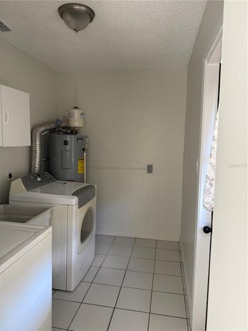1111 E OKALOOSA AVENUE, Tampa, FL 33604