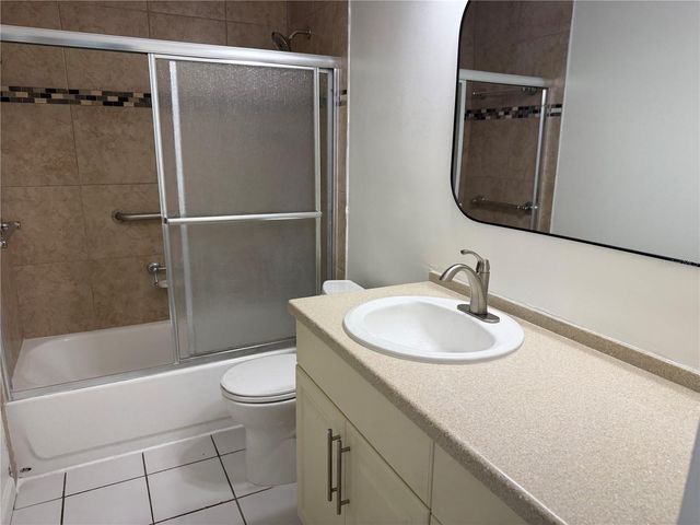 1111 E OKALOOSA AVENUE, Tampa, FL 33604