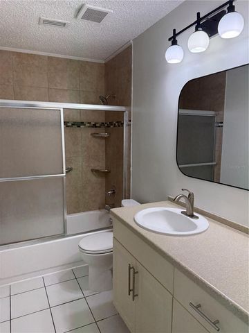 1111 E OKALOOSA AVENUE, Tampa, FL 33604