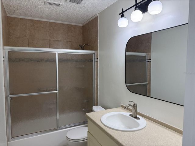 1111 E OKALOOSA AVENUE, Tampa, FL 33604