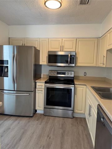 1111 E OKALOOSA AVENUE, Tampa, FL 33604