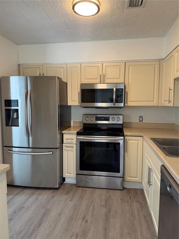 1111 E OKALOOSA AVENUE, Tampa, FL 33604